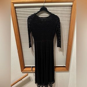 Woman’s Black Dress